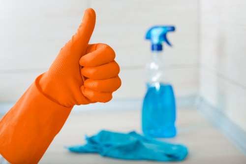 Janitorial team providing office cleaning in Waterloo conference room