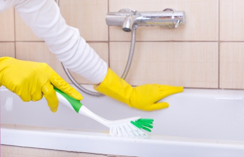 Experienced cleaner in Waterloo maintaining a bright office interior