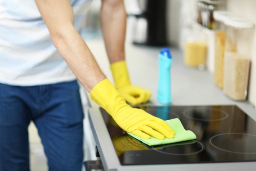 Residential cleaning team in Waterloo preparing a kitchen for deep cleaning